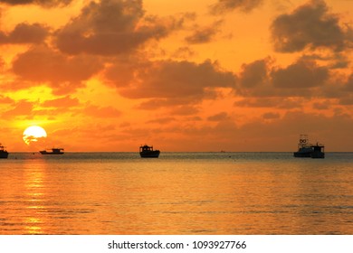 sunset on the sea of the seychelles island with shadow boat 