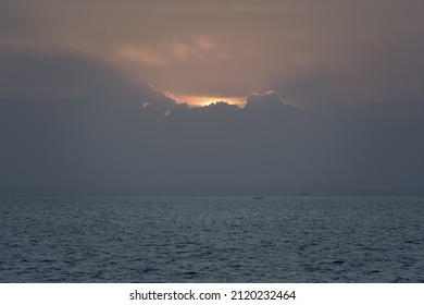 Sunset On The Shore Of Tropical Sea. Summer Vacation On Tropical Resort, Dusk Sky.