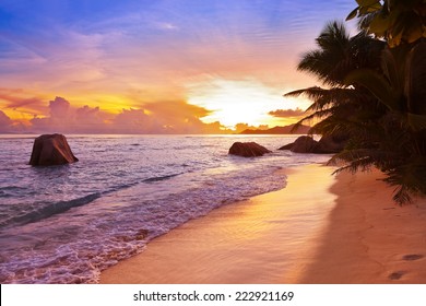 Sunset on tropical beach Source D'Argent at Seychelles - nature background
