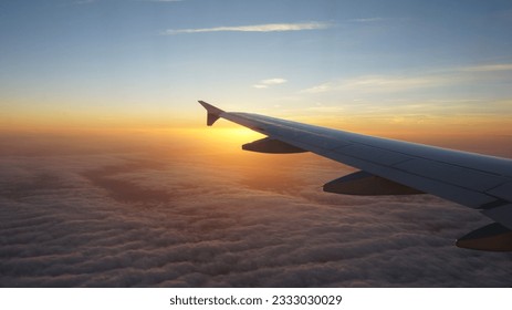 ฺBeautiful sunset outside the plane window