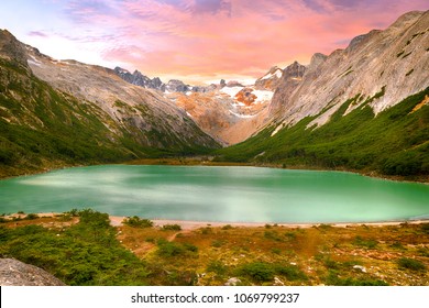 Sunset over Andes mountains and lake Laguna Esmeralda near Ushuaia in Tierra del Fuego, Argentina