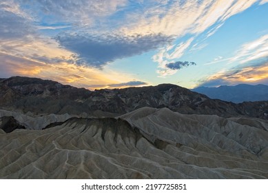 Sunset Over Badlands In Death Valley National Park