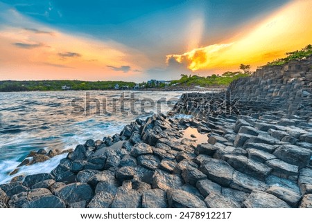 Sunset over basalt columns Giant's Causeway known as UNESCO World Heritage Site, Phu Yen, Vietnam