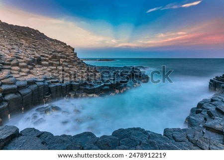 Sunset over basalt columns Giant's Causeway known as UNESCO World Heritage Site, Phu Yen, Vietnam