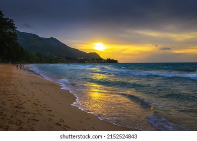 Sunset over the Beau Vallon Beach on the island of Mahe, Seychelles. Beau Vallon Beach is well-frequented and is possibly the most popular beach on the island. - Shutterstock ID 2152524843