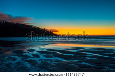 Sunset over Buzzards Bay on Old Silver Beach, Cape Cod