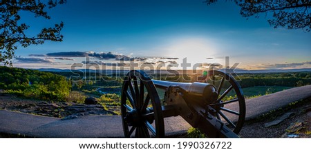 Sunset over a cannon at Gettysburg National Military Park in Gettysburg, Pennsylvania in May of 2020