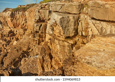 sunset over the cliffs by the ocean