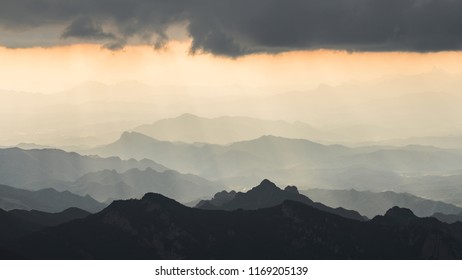 Sunset over the clouds