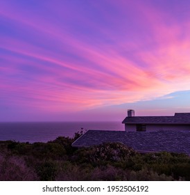 Sunset Over The Coastal Homes