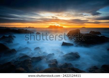 Sunset over Cobo bay, in Guernsey Channel islands.