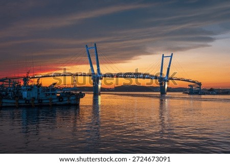 sunset over the Crab Bridge, connecting Baeksajang Port and Deurni Port in Taean County, Chungcheongnam-do