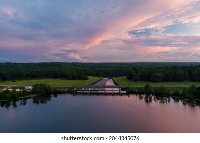 Sunset Over The Dam At Big Creek Lake In Mobile, Alabama 