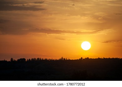 Sunset over the dark forest in Nisporeni, Moldova