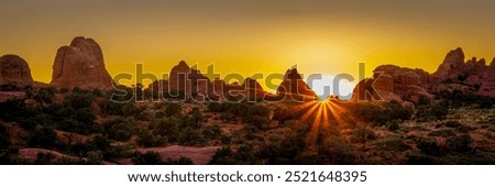 Sunset over Devil's Garden in Arches national Park. The Devil's Garden area in Arches National Park is renowned for its stunning red sandstone rock formations and unique geological features