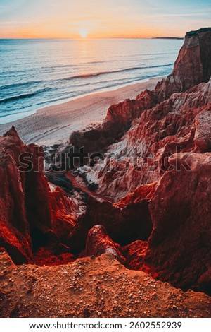 Sunset Over the Dramatic Cliffs and Calm Shores of Falesia Beach, Portugal, in Full Colorful Glory