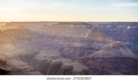 Sunset Over Dramatic Layered Buttes and Mesas in Grand Canyon South Rim Panorama