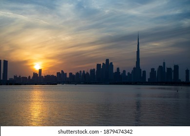 Sunset over Dubai city skyline. - Shutterstock ID 1879474342