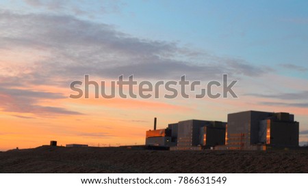 Sunset over Dungeness A, a decommissioned nuclear power station, Kent, UK.