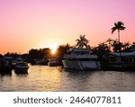 Sunset over in Fort Lauderdale. Scenic canals and yachts in Florida.