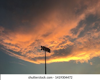 Sunset Over Friday Night Lights Football Field