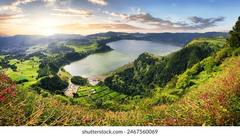 Sunset over Furnas Lake, mountain landscape panorama from Pico do Ferro, Sao Miguel Island, Azores, Portugal - Powered by Shutterstock