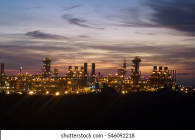 Sunset Over A Gas Plant Just Outside Of Port Moresby, Papua New Guinea