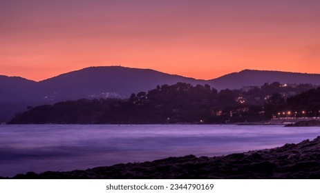 Sunset over the Gigaro beach of La-Croix-Valmer on the Mediterranean coast of the Var department in France in summer