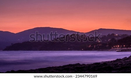 Sunset over the Gigaro beach of La-Croix-Valmer on the Mediterranean coast of the Var department in France in summer