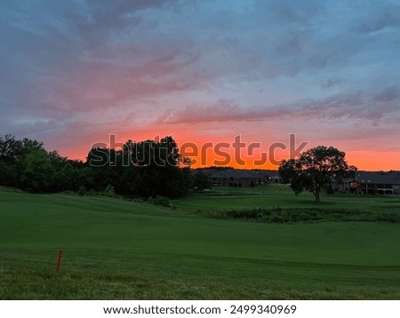 Sunset over a golf course