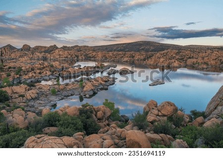 Sunset over the Granite Dells at Watson Lake near Prescott, Arizona.