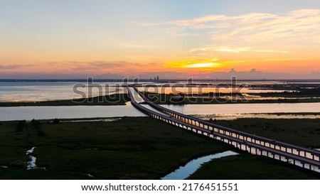 Sunset over the Jubilee parkway bridge and  Mobile Bay on the Alabama Gulf Coast in July 2022 