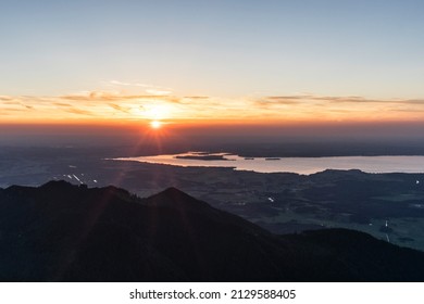 Sunset over Lake Chiemsee from the summit of Mount Hochfelln.