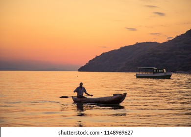 Sunset Over The Lake Dugout Canoe 