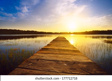 Sunset over the lake with a pier in Guatemala - Powered by Shutterstock