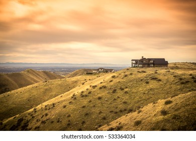 Sunset Over A Lone House On A Hill Over Looking Boise, Idaho.