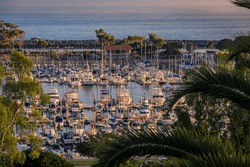 Sunset Over Luxury Yachts And Boats In Dana Point Harbor, Orange County In Southern California