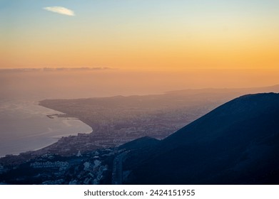 Sunset over Mediterranean sea  and Fuengirola from Calamorro peak, Costa del Sol, Andalusia, Spain