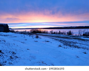 Sunset Over Storsjön In Mid Winter Time, View From A Field In Gärde, Hackås Towards Hoverberget