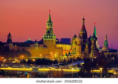 Sunset Over The Moscow Kremlin, Russia. Moscow City Skyline, Cityscape. Bridge In The Park Zaryadye. Moscow Kremlin, Cathedral Of Vasily The Blessed, Spasskaya Tower