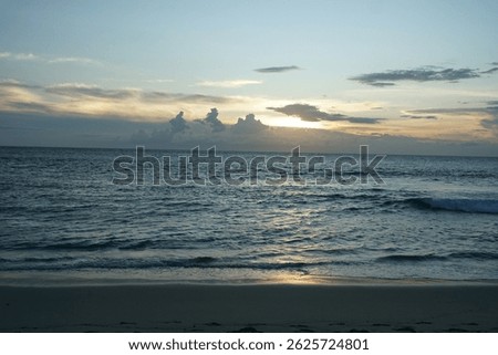 Sunset over ocean waves seaside nature photography tranquil environment serene viewpoint coastal beauty