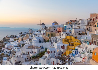 Sunset over Oia village In Santorini island, Greece - Shutterstock ID 2186095469