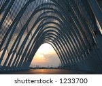 sunset over Olympic Stadium arch