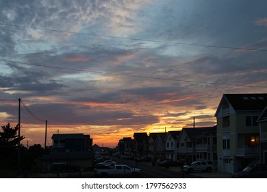 Sunset Over Ortley Beach, NJ. Beach Houses In The Foreground.