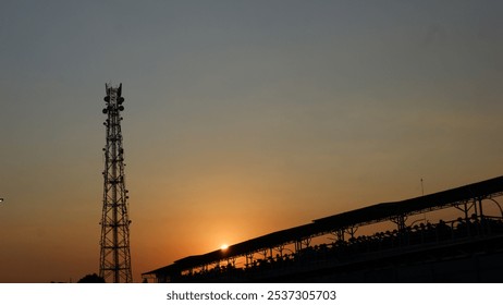 Sunset over the park areas of Tugu train station Jogja. View of panorama sunset or dusk at Yogyakarta, Indonesia. - Powered by Shutterstock