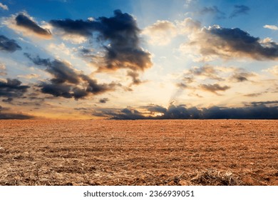 Sunset over plowed field. plow soil high raised style. Farming and Agriculture Preparation  - Shutterstock ID 2366939051