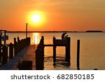 Sunset Over the River Dock