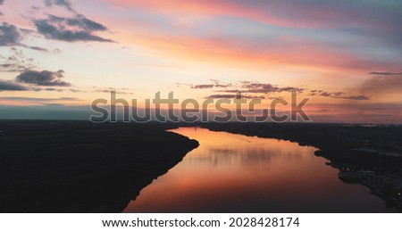 sunset over the river. river landscape. Sunset with reflection on the water. Panorama