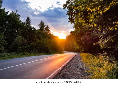 Sunset over the road - Powered by Shutterstock