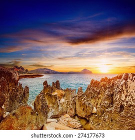 Sunset over the rocks.